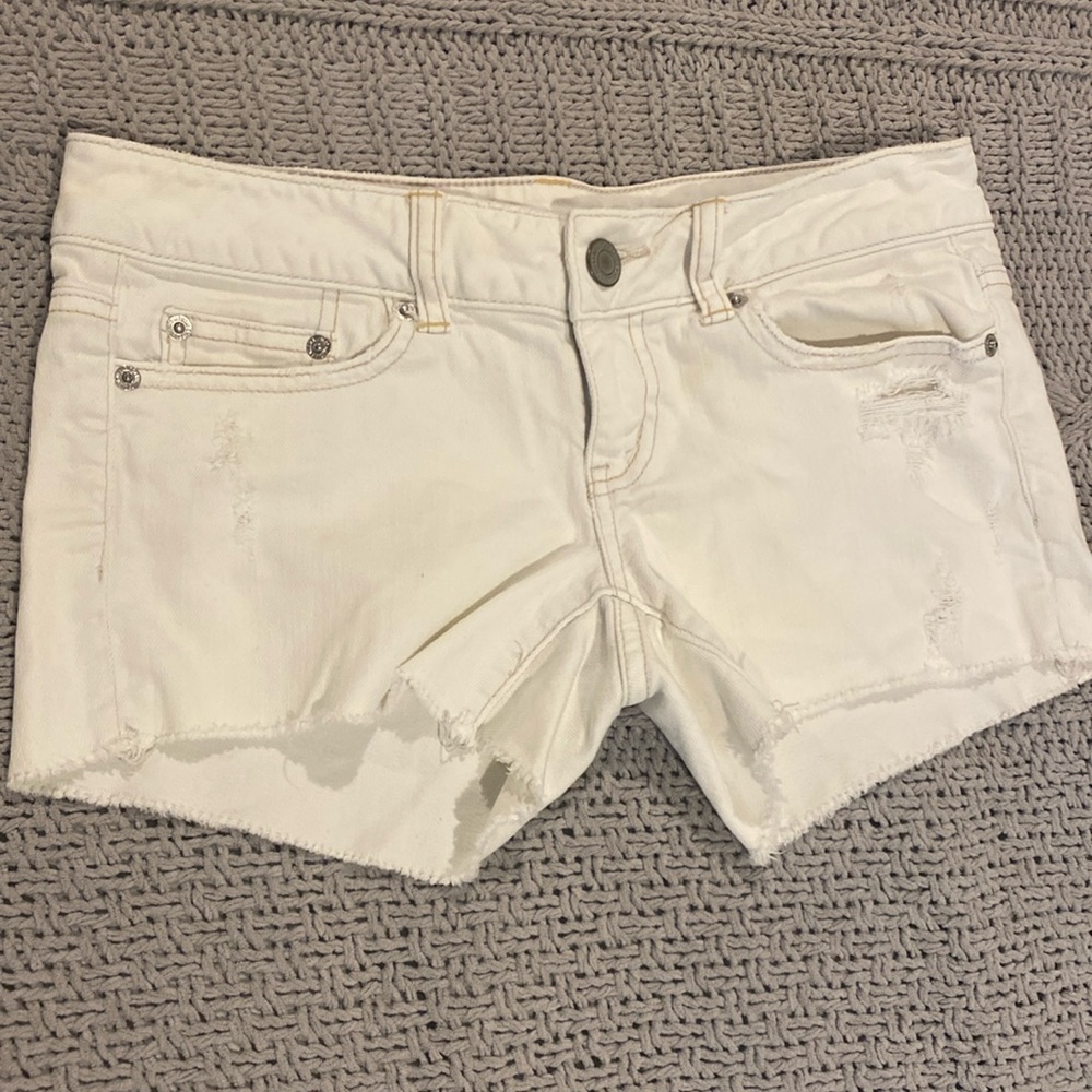 Distressed denim shorts